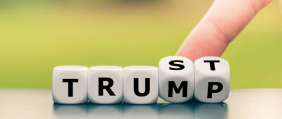 Hand,Turns,Dice,And,Changes,The,Word,”trump”,To,”trust”.